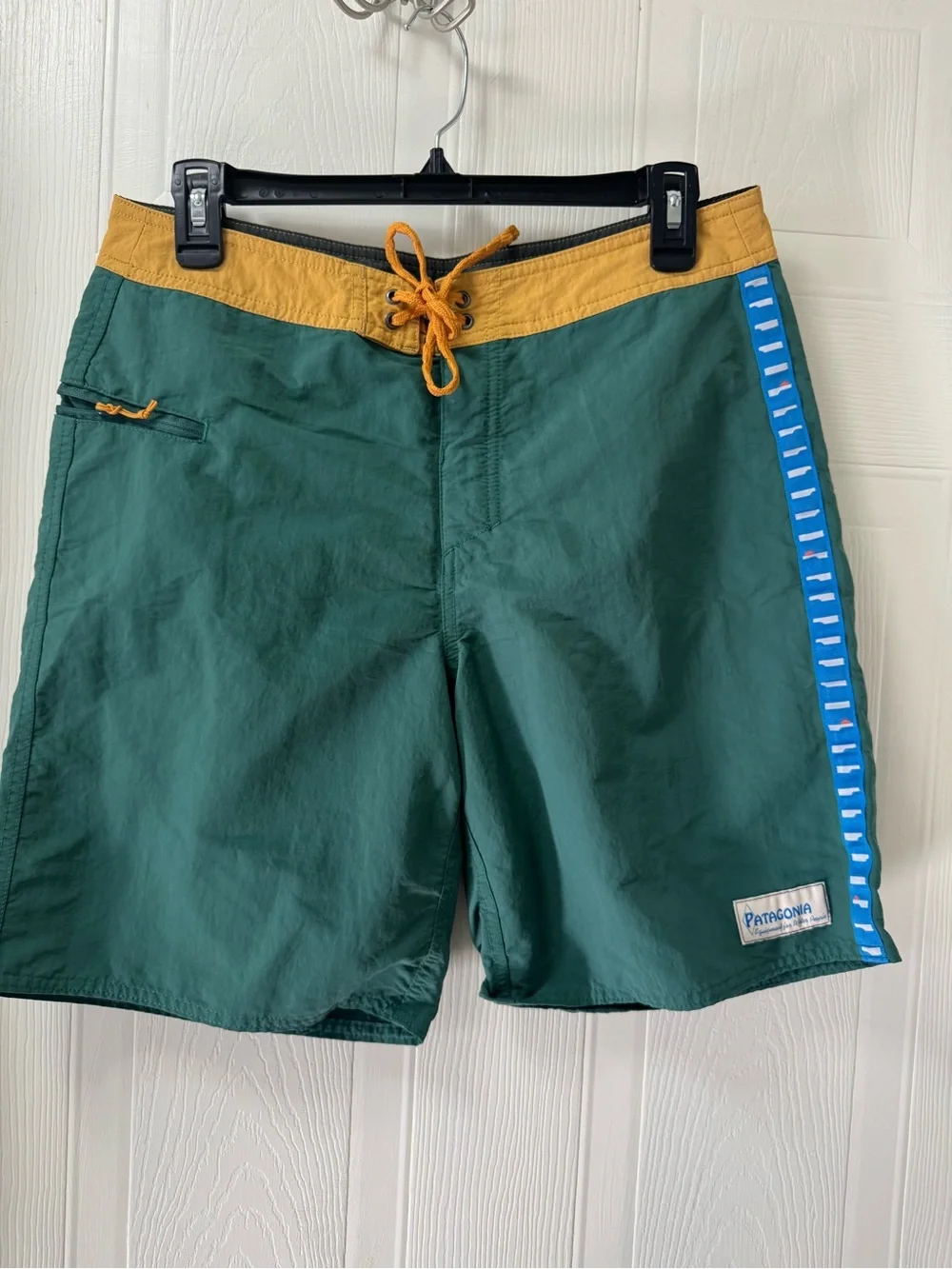 Patagonia Green Swim Board Shorts with Mustard Waistband and Blue Side Stripe